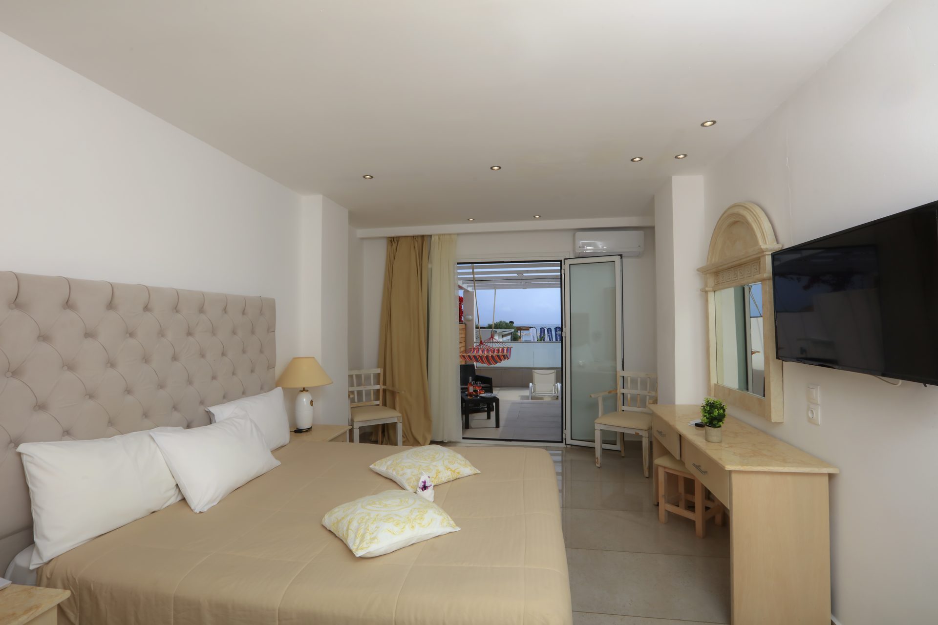 Cavomarina Beach Hotel — Rooms