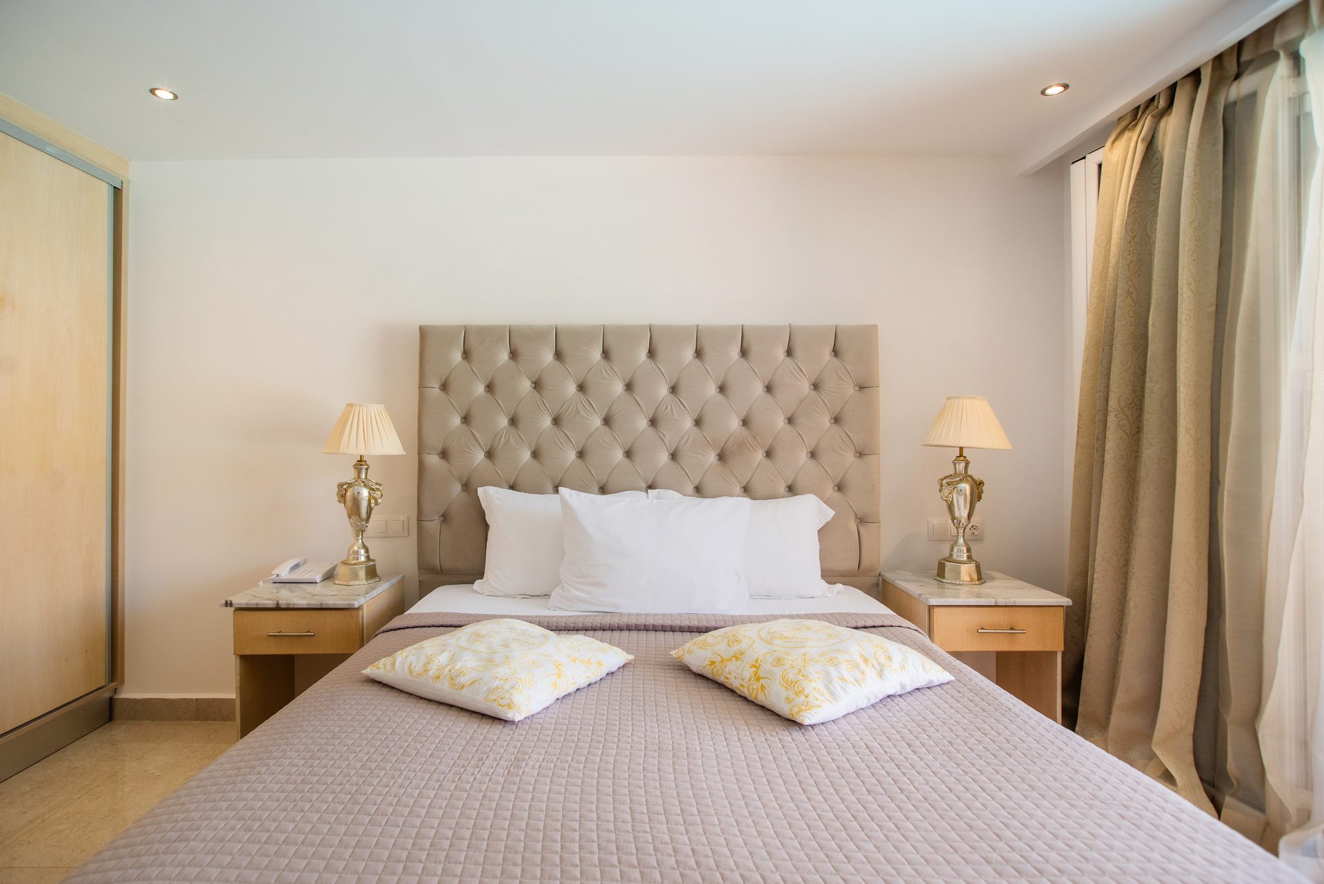 Cavomarina Beach Hotel — Rooms